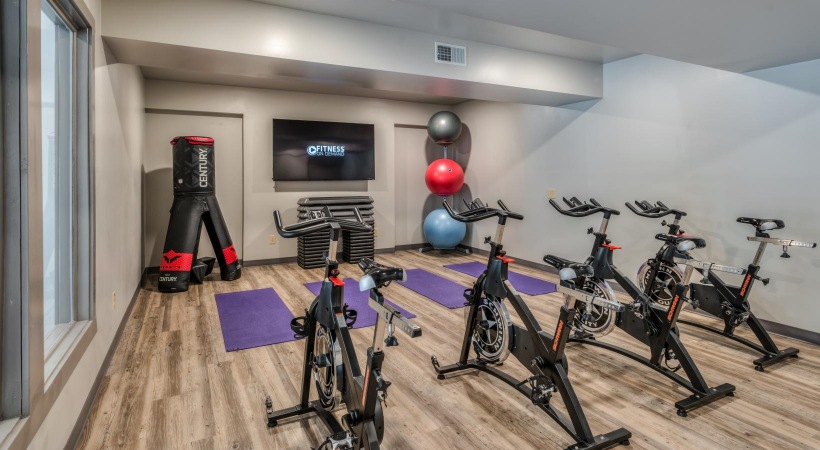 a room with bikes and exercise equipment